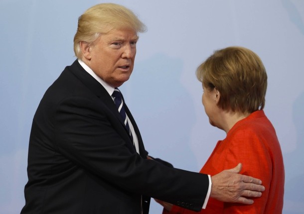 Trump nu e de acord cu declarația finală a summitului G20 propusă de Merkel