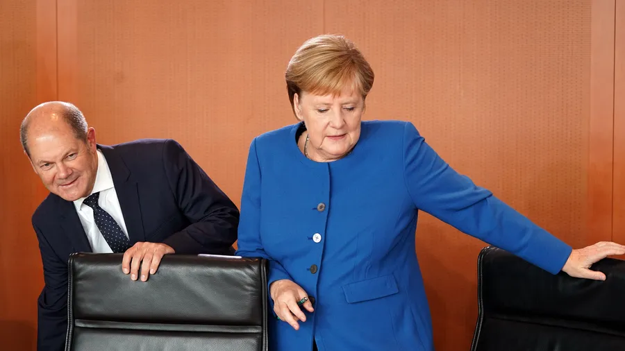 De la Merkel la Scholzomat De la Merkel la Scholzomat